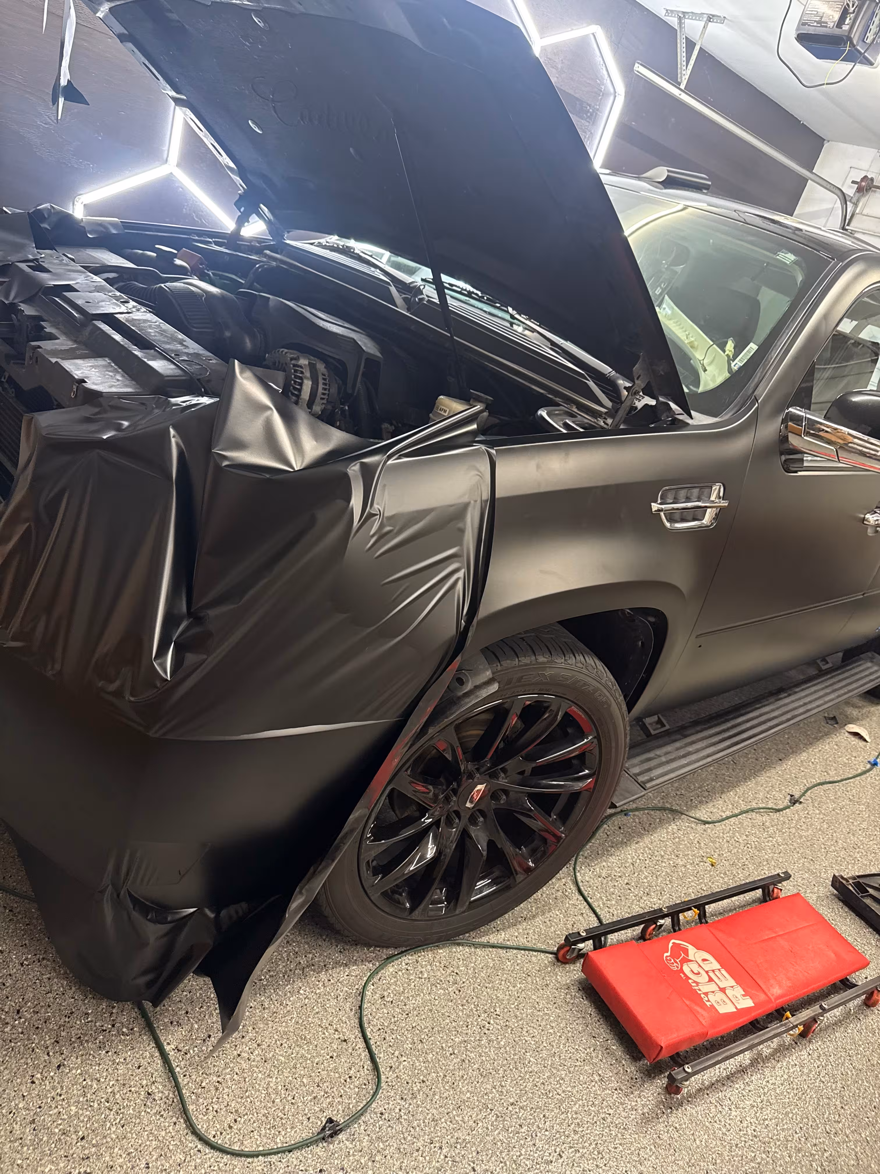 Cadillac wrap being applied